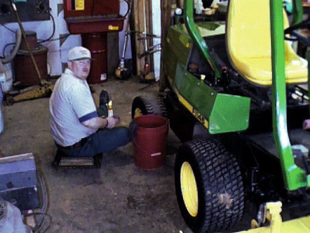 Harold prepares mower